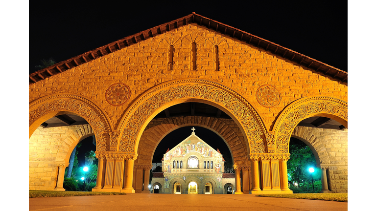 View Of Illuminated  Stanford University , Building At Night. Palo Alto