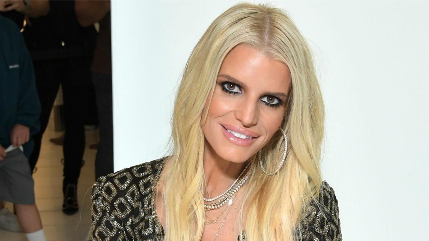 See Jessica Simpson Rock Her 8th Grade Cheerleader Jacket At 42 Iheart 