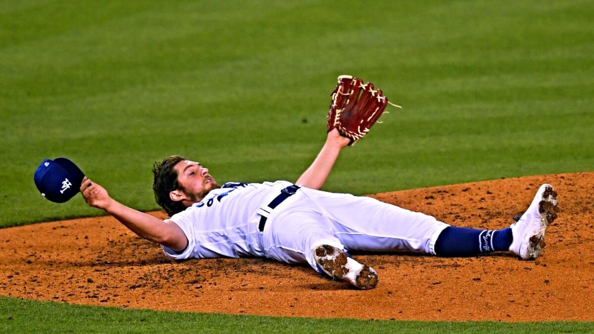 Dodgers pitcher Trevor Bauer reinstated after arbitrator reduces