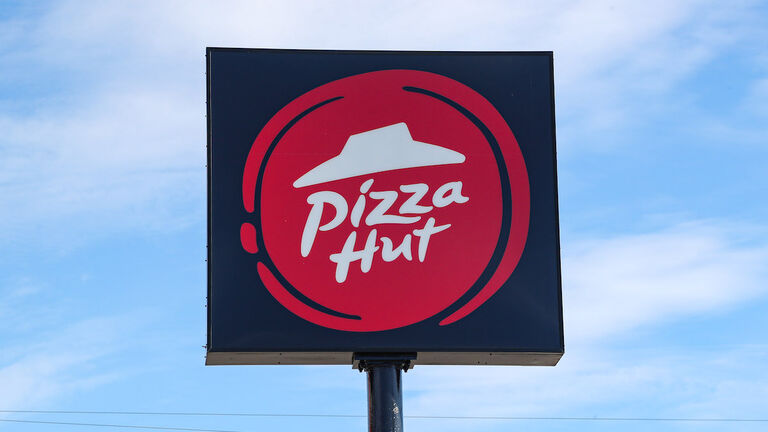 A sign with the Pizza Hut logo is seen at its restaurant in