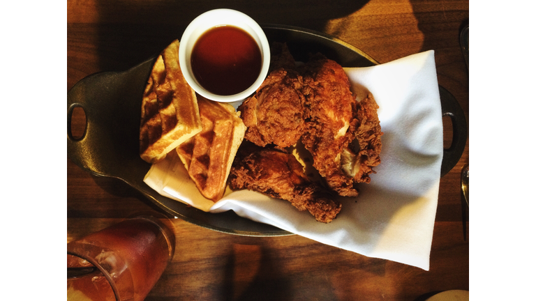Directly Above Shot Of Waffles With Fried Chicken And Coffee In Plate