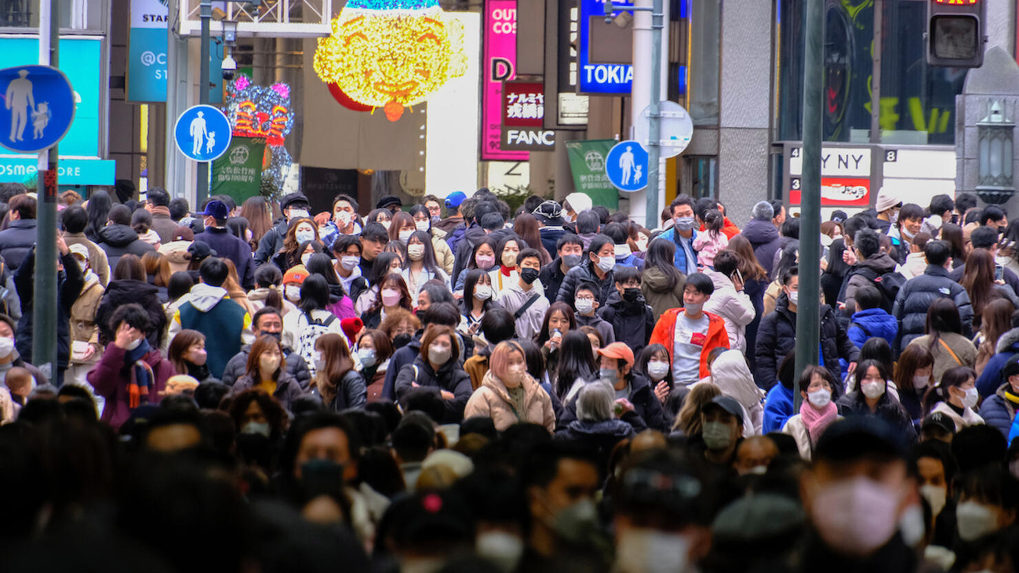 People shop along the streets of Shinsaibashi in Osaka,