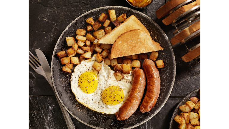 Breakfast with Sunny side up eggs and Sausage