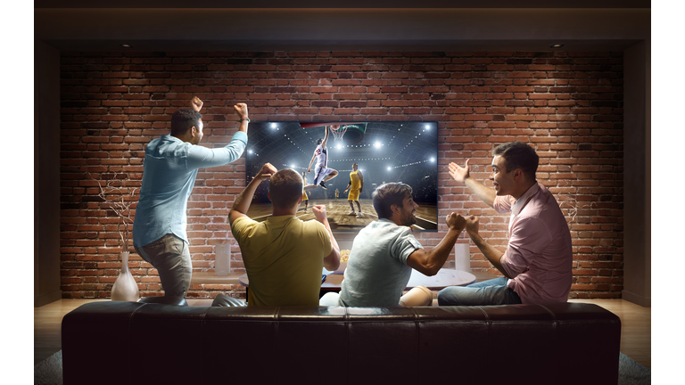 Students watching Basketball game at home