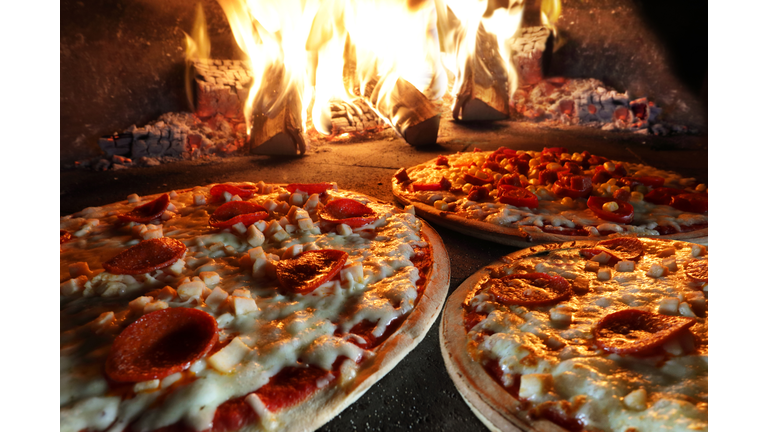 Pizzas in pizza oven