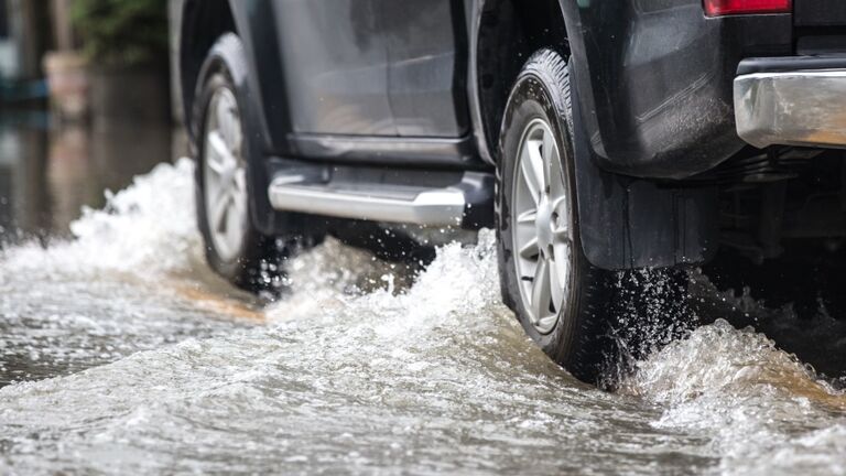 Pickup truck on a flooded street