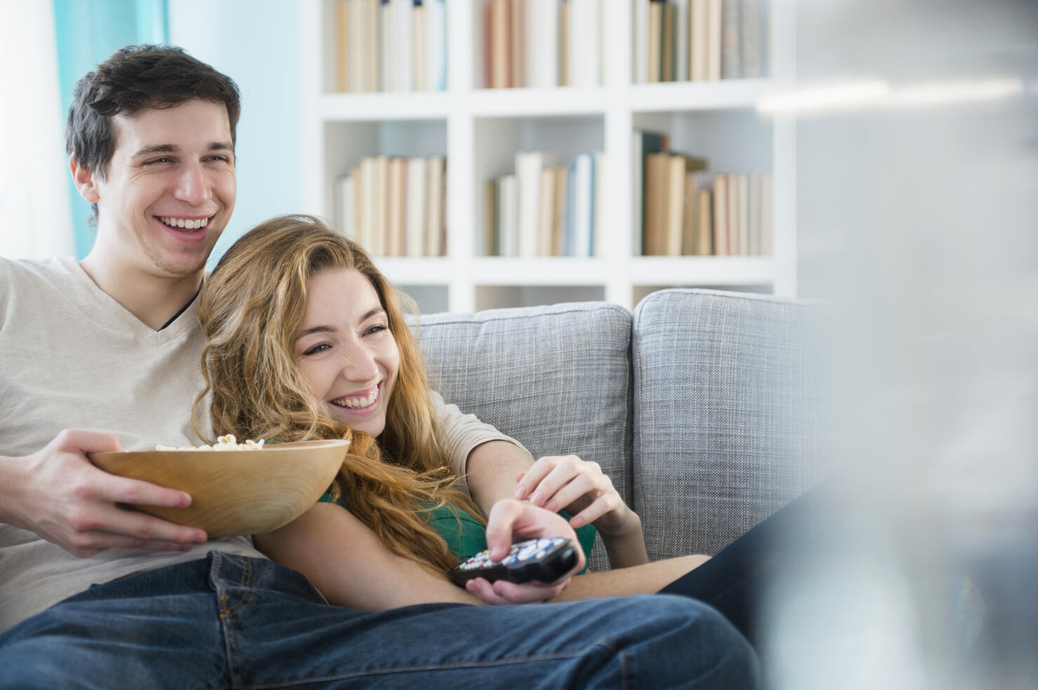 Couple watching TV together