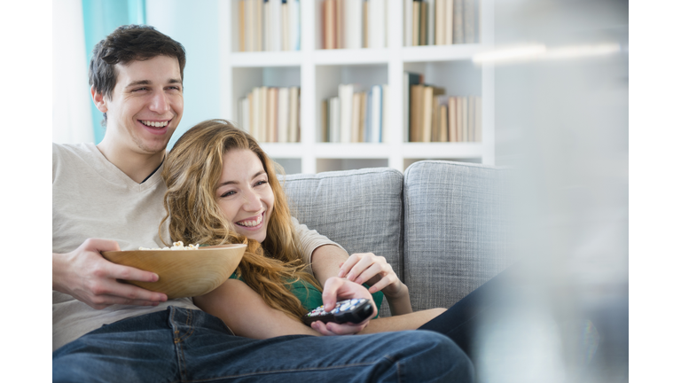 Couple watching TV together