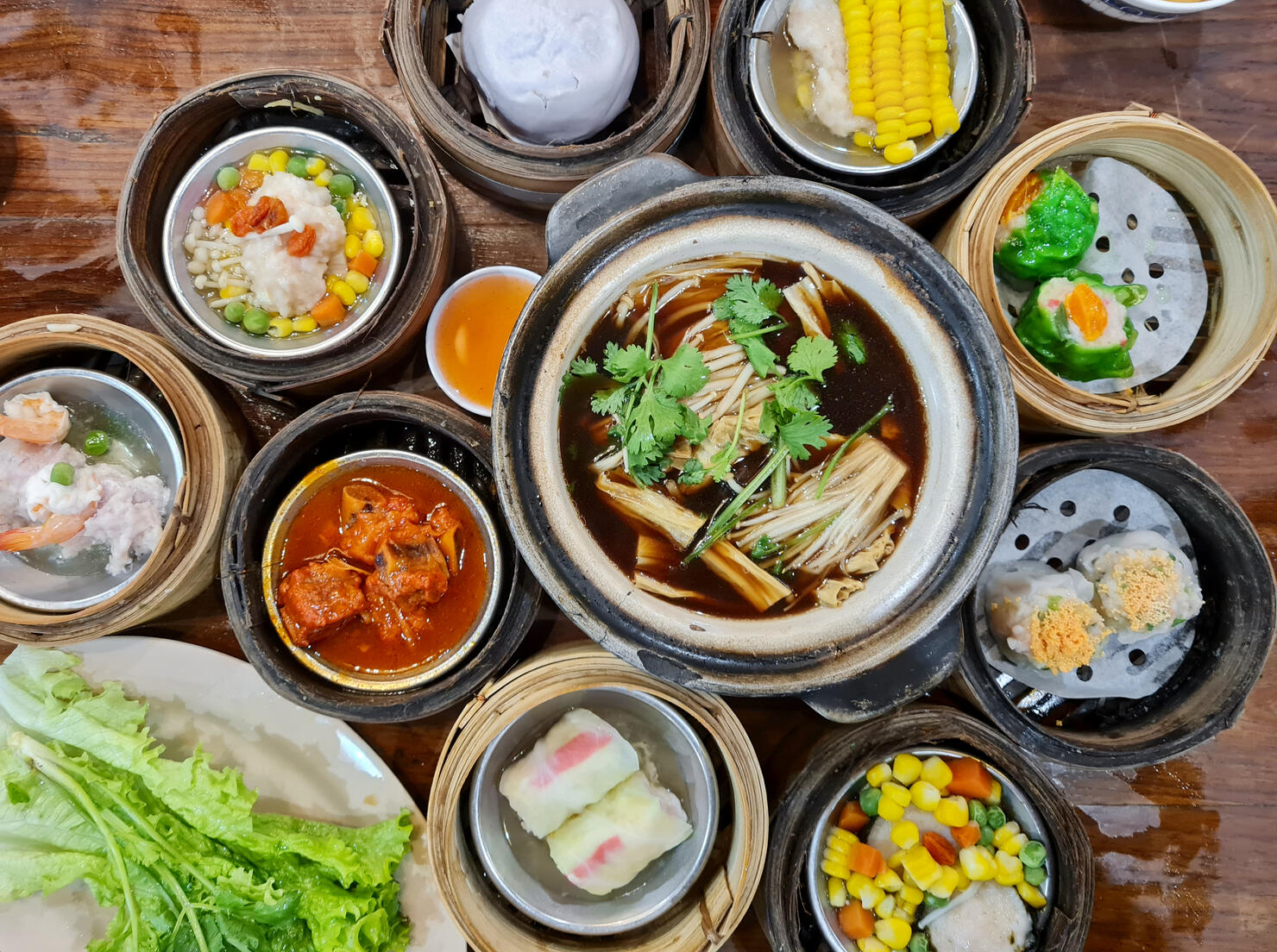 Set of Chinese food: mushroom soup and steamed food