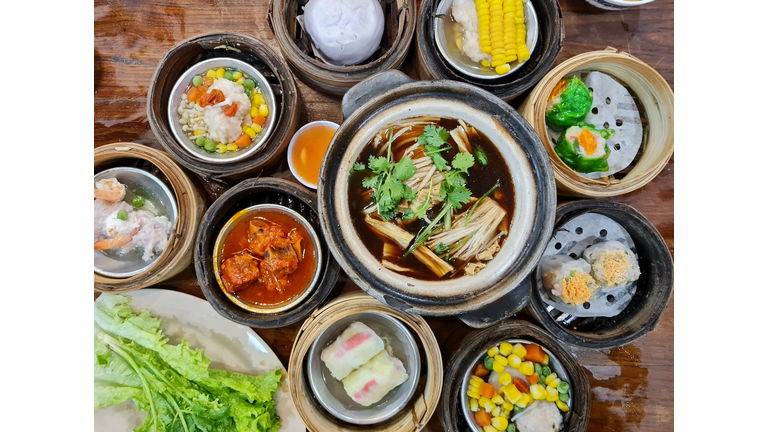 Set of Chinese food: mushroom soup and steamed food