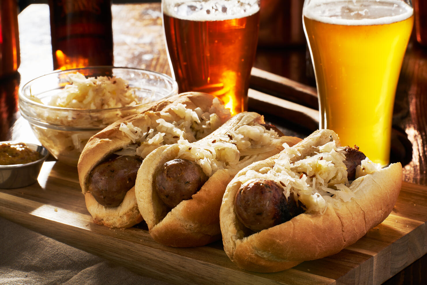 german bratwursts and sauerkraut with beer