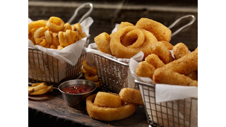 Baskets of Onion Rings, Curly Fries and Cheese Sticks