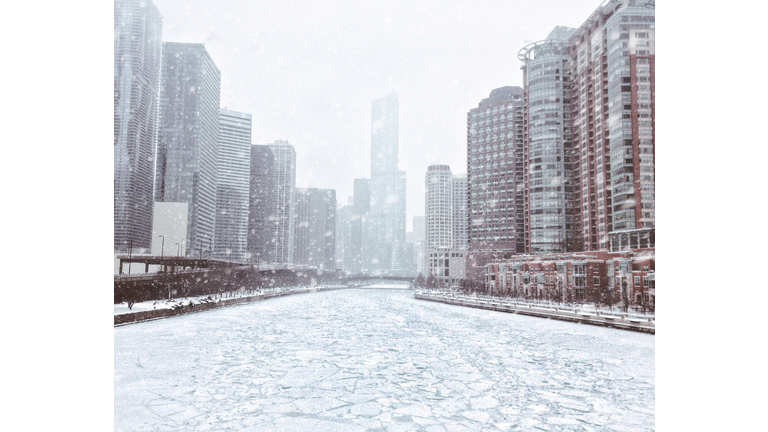 Modern Buildings In City During Snowfall