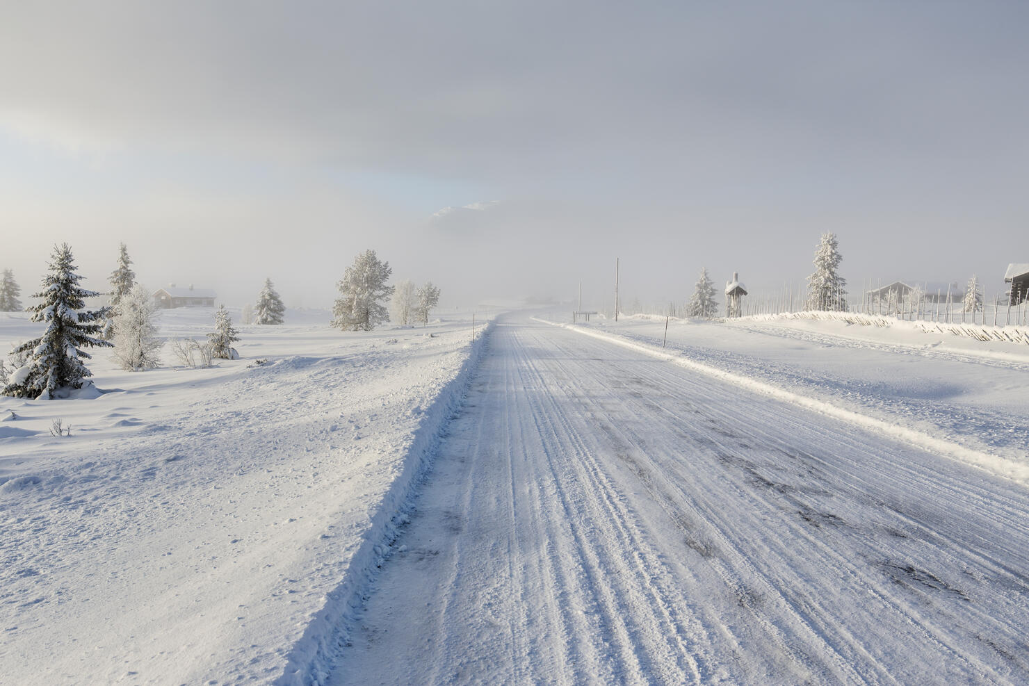 Frozen road in snow landscape,Norway.