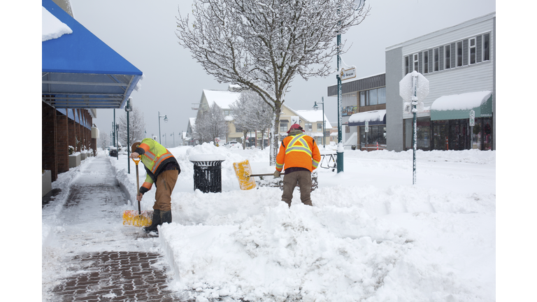 City workers shovelling snow