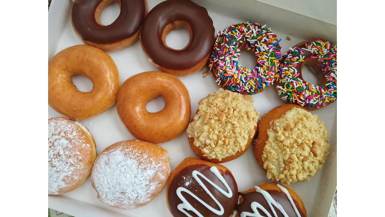 Directly Above Shot Of Donuts In Box On Table