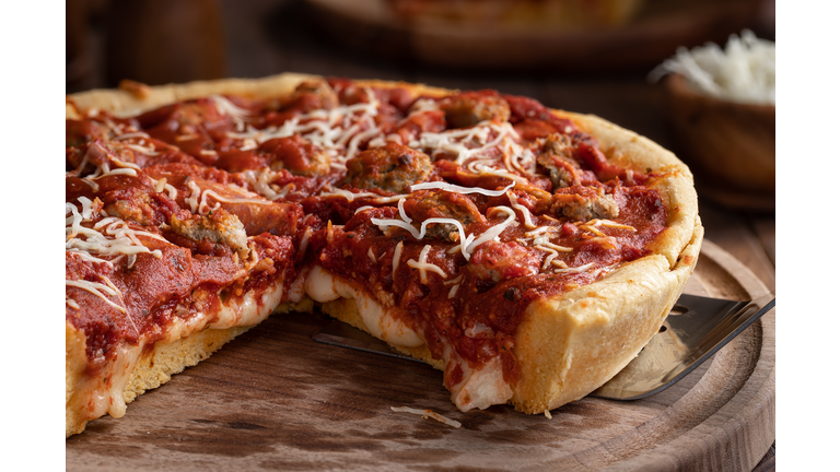 Sliced Sausage Deep Dish Pizza