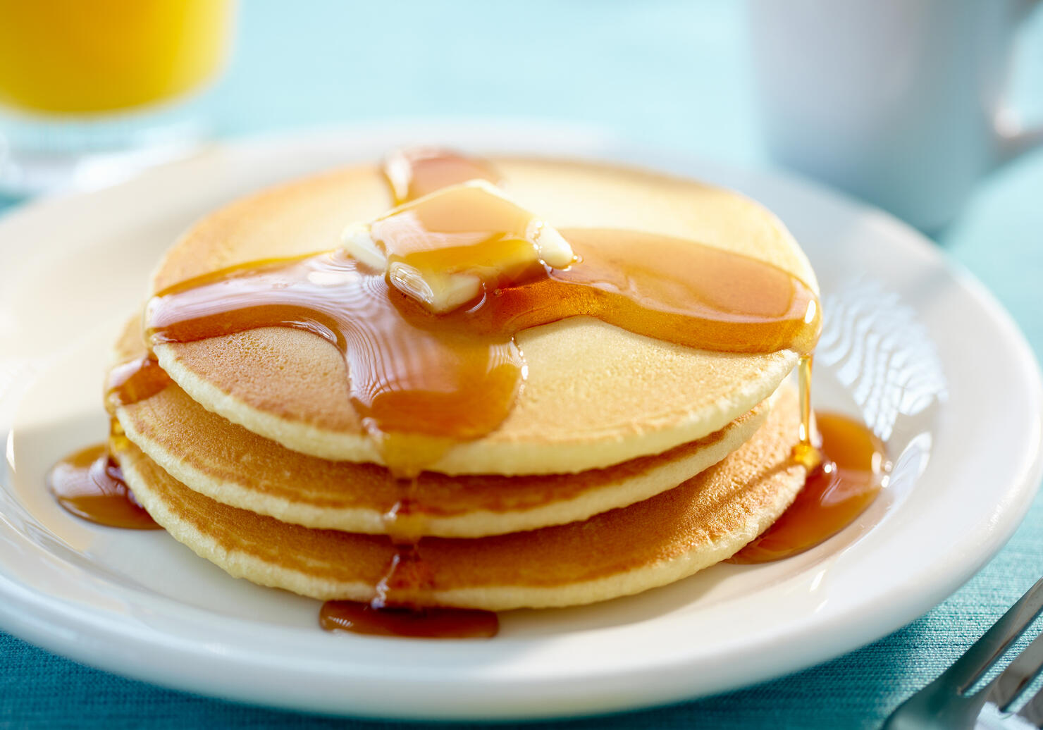 Pancakes with butter and syrup