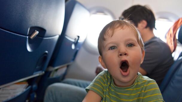 Video Of Woman's Reaction To Toddler Grabbing Her On Plane Gets Her Shamed