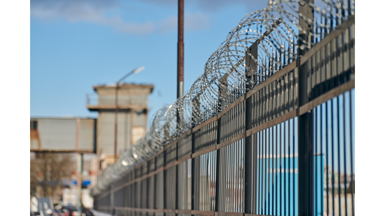 Barbed Wire On Fence, Steel Grating Fence, Metal Fence Wire. Private Area, Protection, Safety