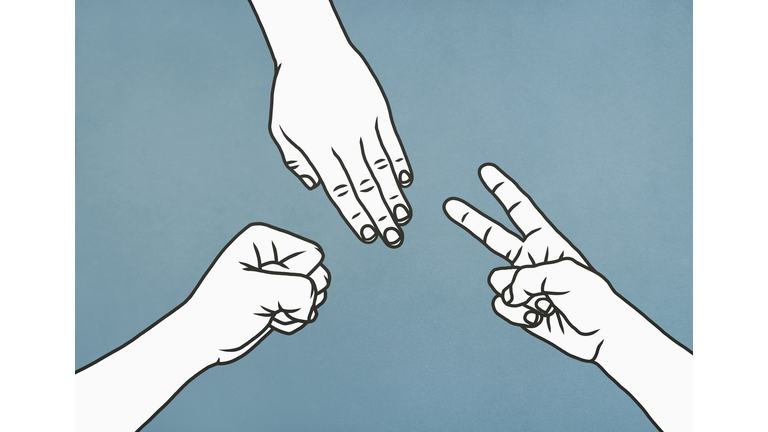 People playing paper, rock, scissors