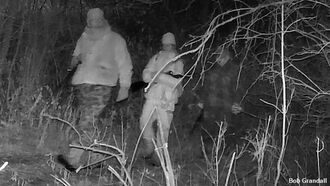Trail Cam Photographs Ghostly Figure Following Pair of Hunters in New York