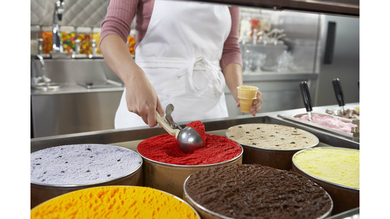 Person scooping ice cream