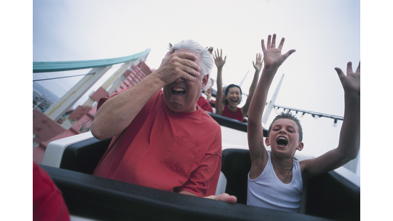 Man with Son on Rollercoaster