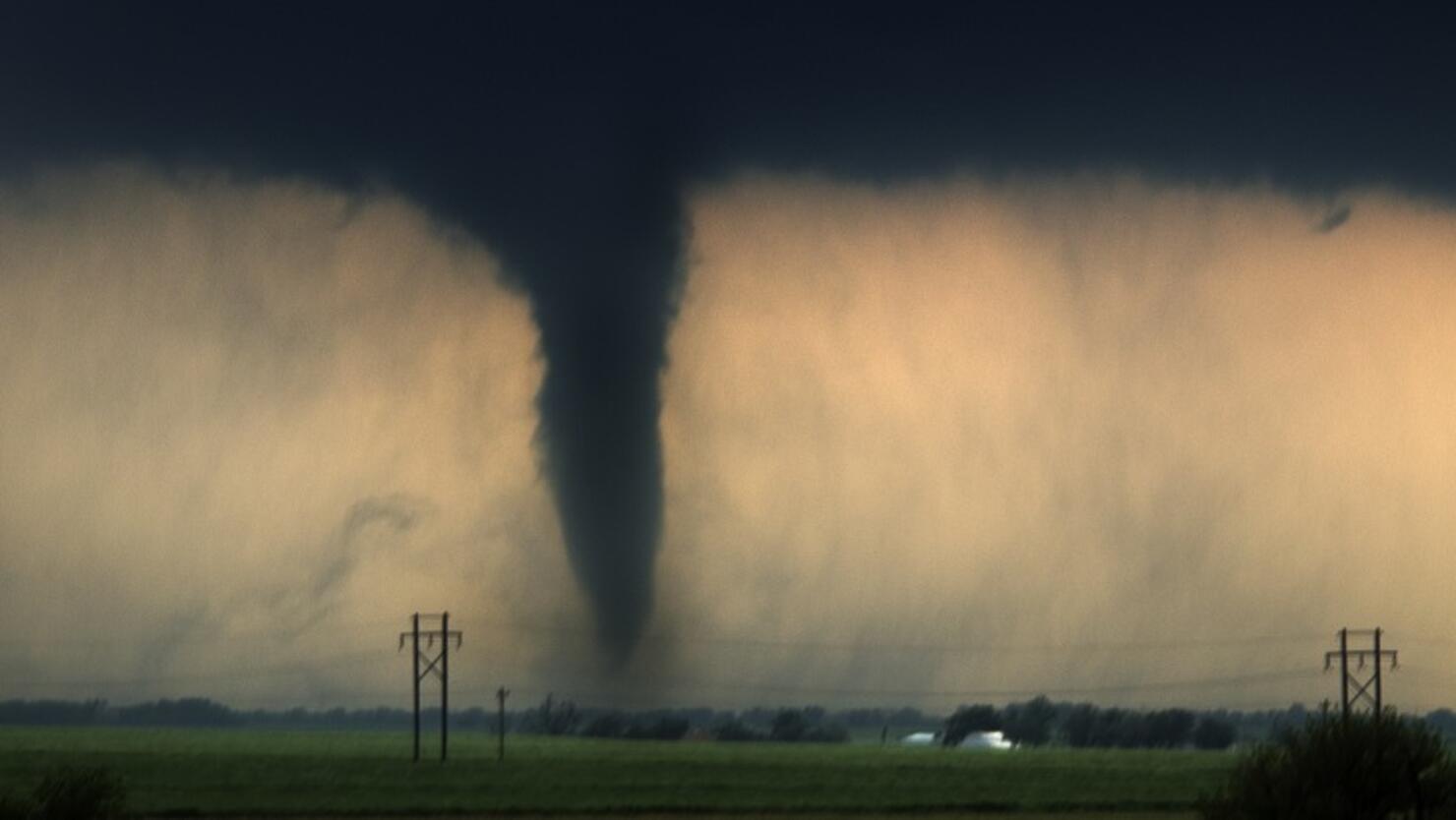 Watch: Woman Sucked Out of Building While Filming Tornado in Arkansas ...