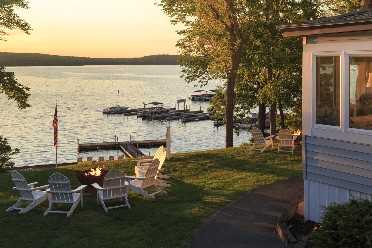 Fire pits at sunset at lake resort
