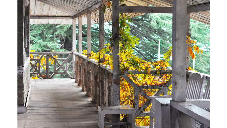 Empty log cabin house balcony