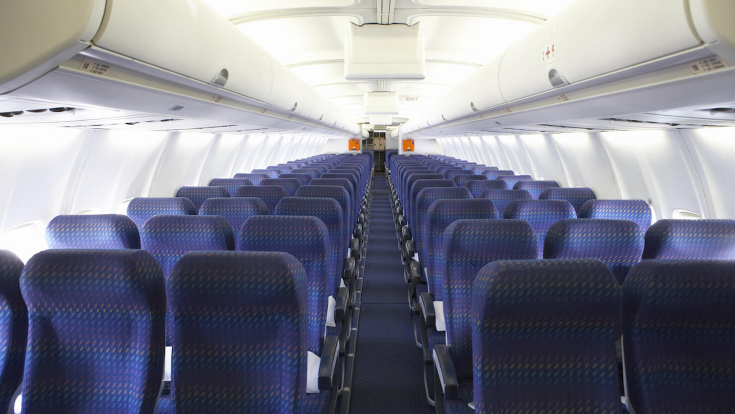 Rows of empty seats on airplane