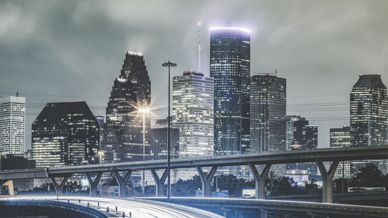 downtown of Houston in the rain at night