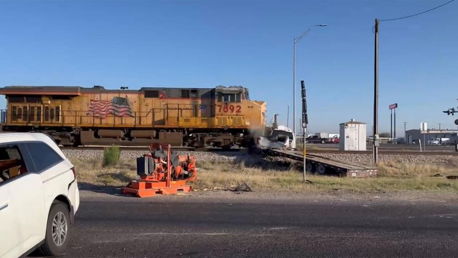 A train slams into a truck