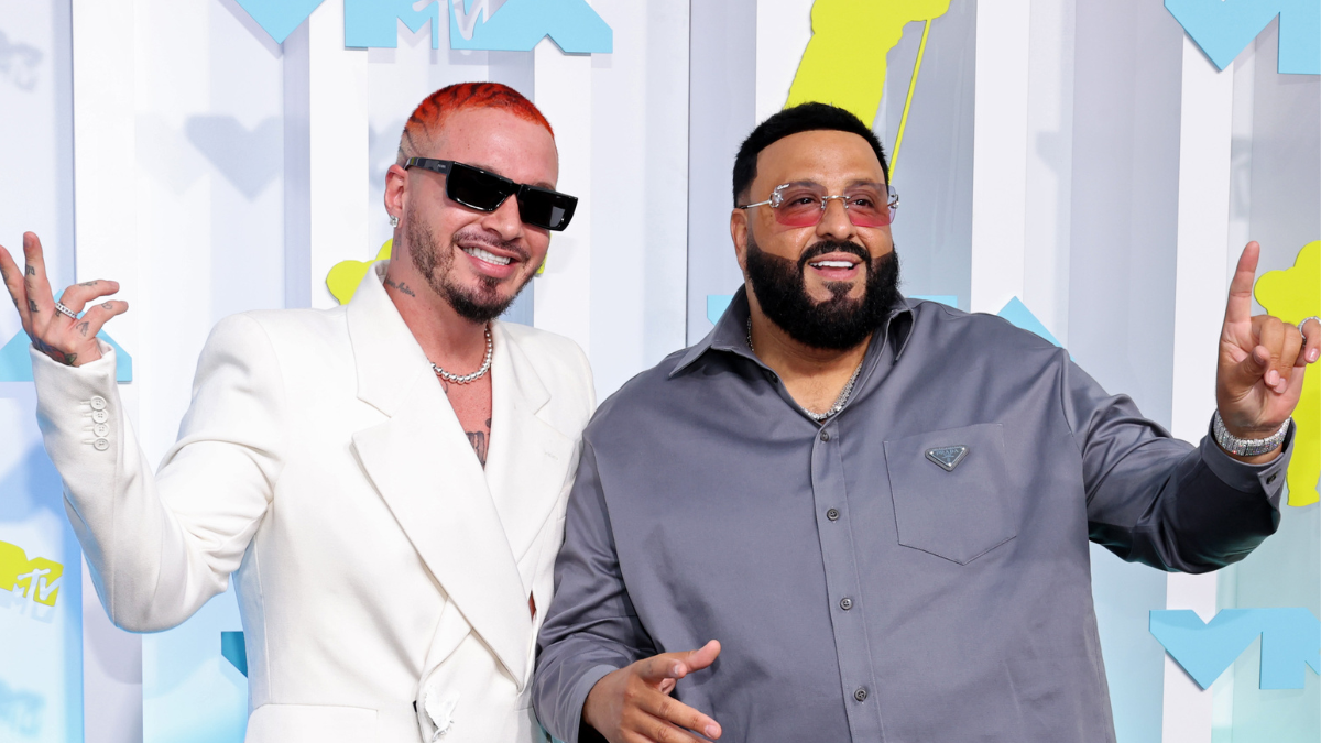 J Balvin gives DJ Khaled the sneakers off his feet on the golf
