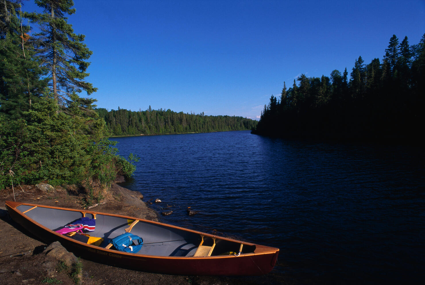 Canoe Along Lakeshore