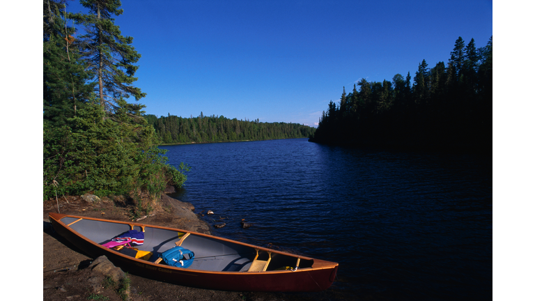 Canoe Along Lakeshore