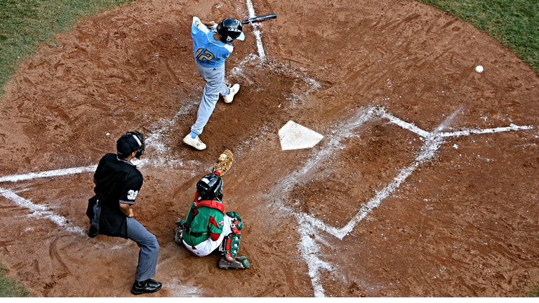 Teen Umpire Helps Youth Baseball Player Caught In Dust Devil