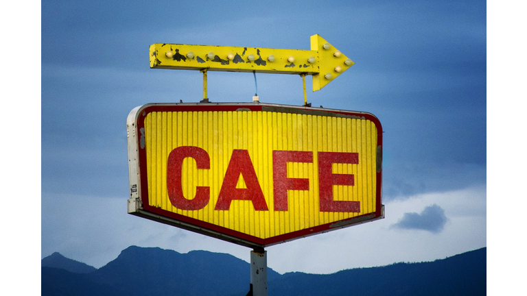 Retro cafe sign, old-fashioned neon light cafe sign.