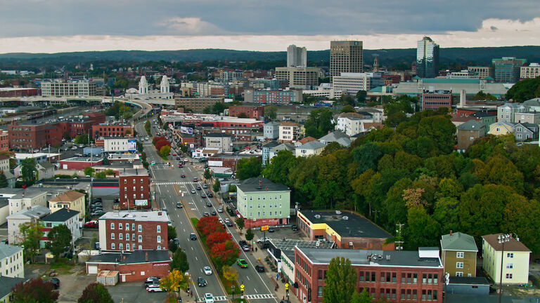 Wide Street Through Residential Area of Worcester, MA - Aerial