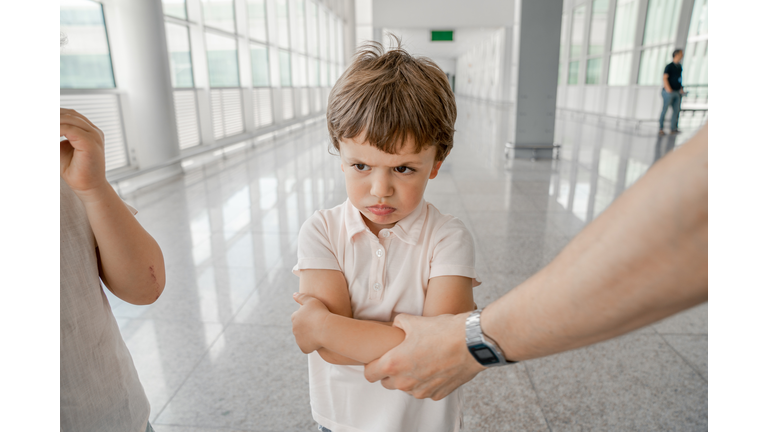 Angry boy at the airport