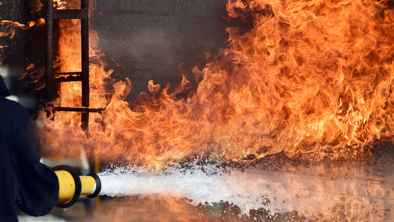 Firemen ,Fireman in action activated foam .