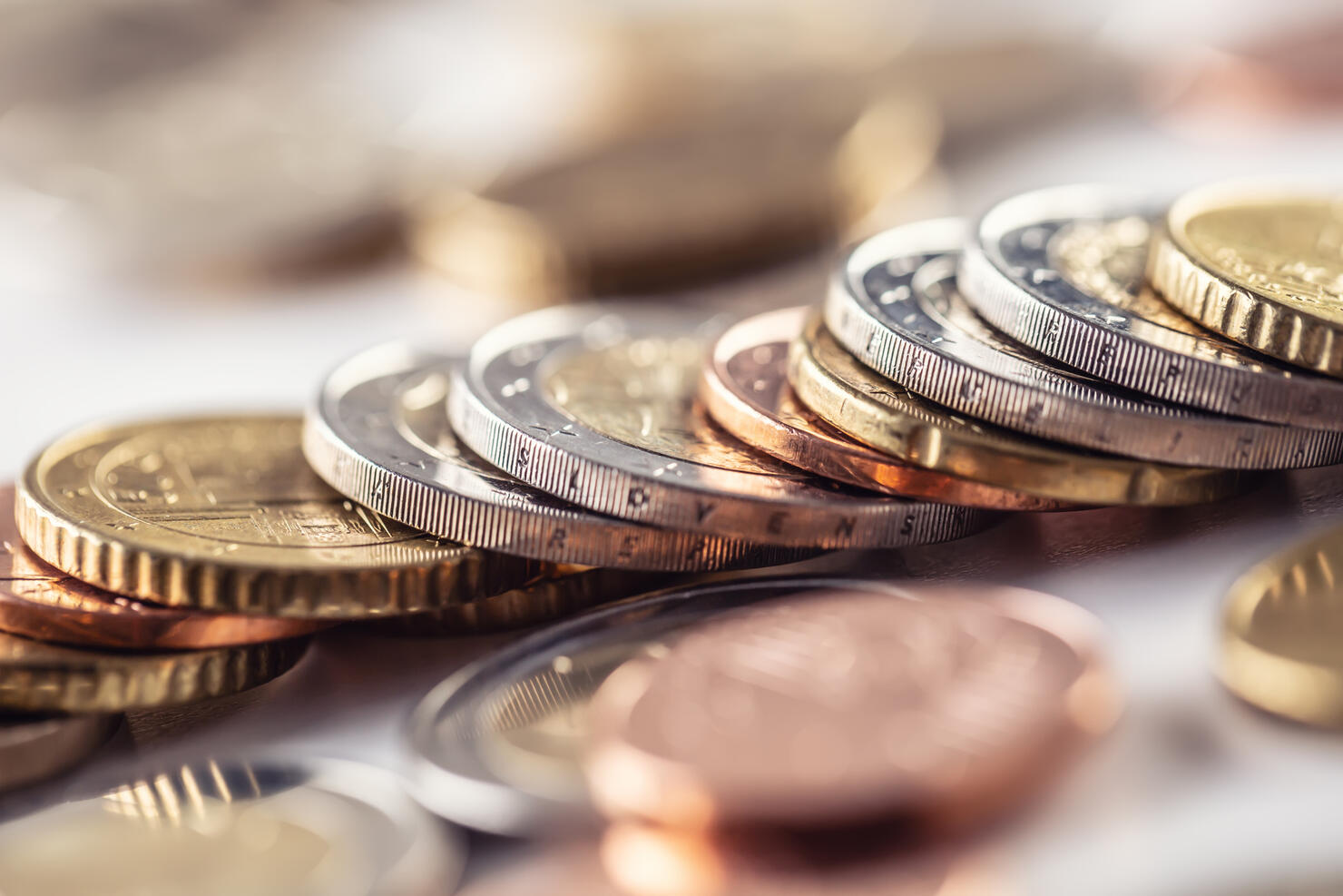 Euro coins stacked in different positions. Currency of the European Union.