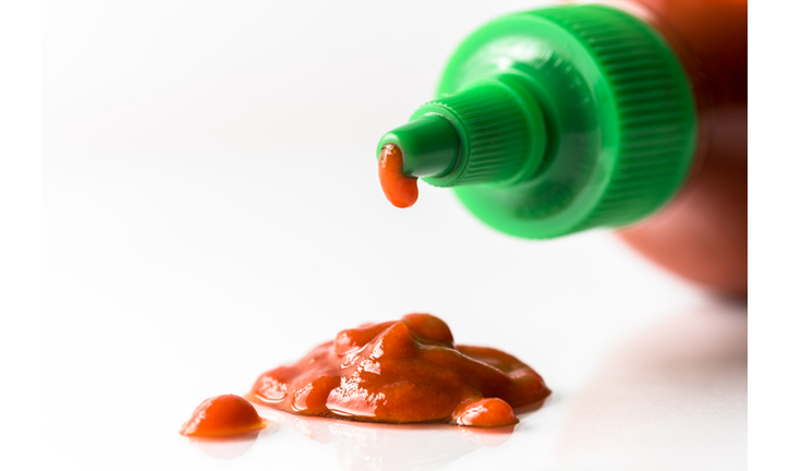 Hot Sauce Spilled from a the Bottle