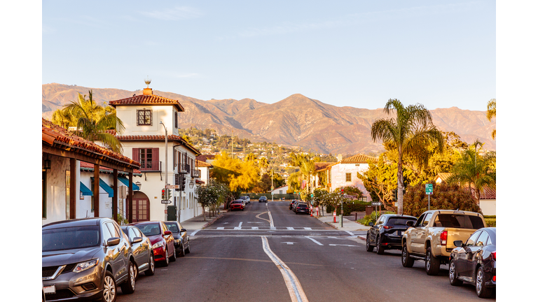 Street in Santa Brabara with mountains in the background, California, USA