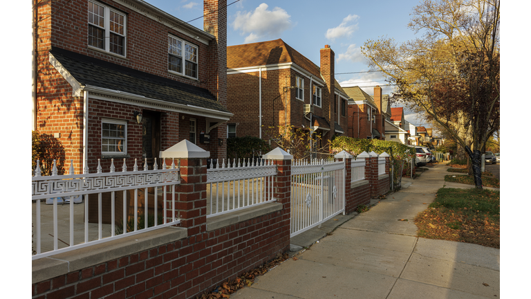 Residential neighborhood in Flushing, Queens, New York City in autumn on a sunny day.
