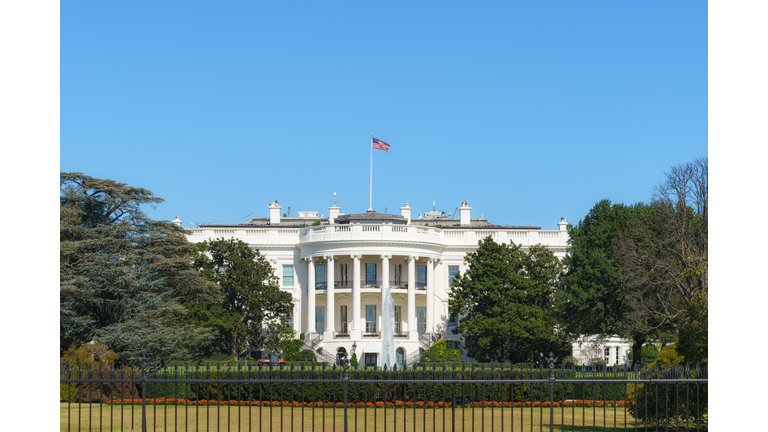 White House on deep blue sky background in Washington DC, USA."n