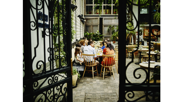 Multi-generational family dining in restaurant