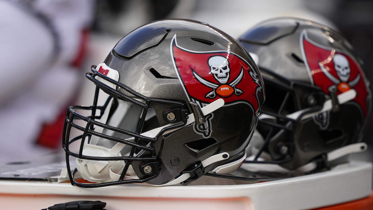 New Tampa Bay Buccaneers uniform features throwback orange, reflective  chrome - Sports Illustrated