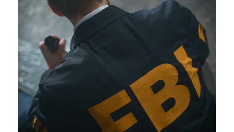 FBI agent's uniform with inscription on a man's back